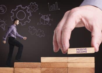 Business, Technology, Internet and network concept. Young businessman shows the word: Passive income