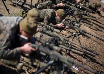 Students with the Marine Scout Sniper School, Advanced Infantry Training Battalion, School of Infantry-East, conduct a known-distance course of fire at Hathcock Range, Stone Bay, Feb. 8, 2016. Students will fire various known-distance courses of fire in order to familiarize themselves with their weapon systems. (U.S. Marine Corps photo by SOI-East Combat Camera, Cpl. Andrew Kuppers/Released)