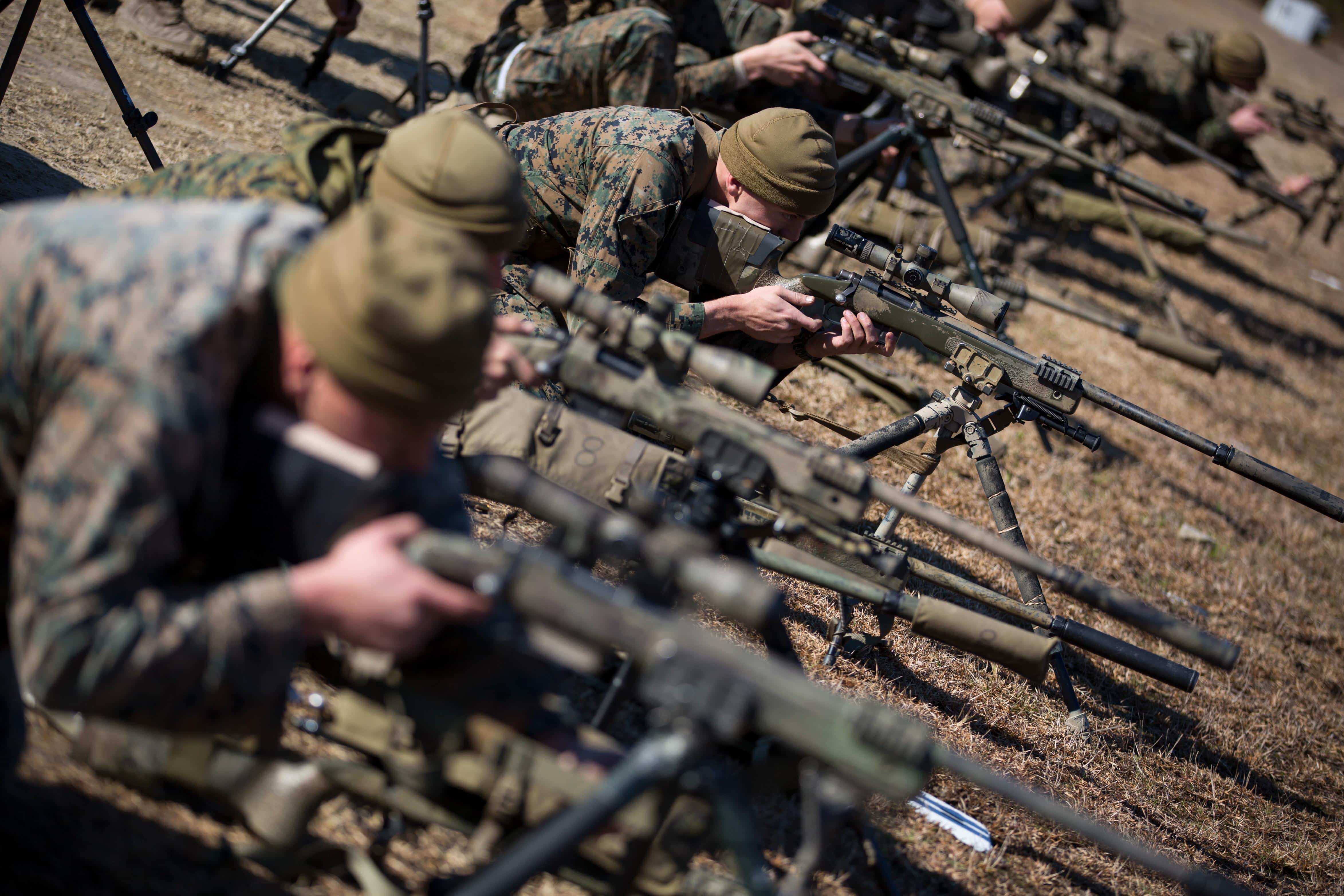 Students with the Marine Scout Sniper School, Advanced Infantry Training Battalion, School of Infantry-East, conduct a known-distance course of fire at Hathcock Range, Stone Bay, Feb. 8, 2016. Students will fire various known-distance courses of fire in order to familiarize themselves with their weapon systems. (U.S. Marine Corps photo by SOI-East Combat Camera, Cpl. Andrew Kuppers/Released)