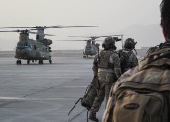 U.S. Special Forces Soldiers, attached to Special Operations Task Force-Afghanistan, alongside Afghan agents from the National Interdiction Unit, NIU, prepare to load onto CH-47 Chinook Helicopters prior to an operation in the Ghorak district, Helmand province, Afghanistan, Sept. 12, 2016. The operation was conducted to disrupt and destroy drug labs owned by the Taliban in the area. (U.S. Army photo by Sgt. Connor Mendez/Reviewed)
