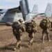 A group of Australian Soldiers prepare to fly in an MV-22B Osprey tiltrotor aircraft with Marine Medium Tiltrotor Squadron 265 (Reinforced), 31st Marine Expeditionary Unit in Bowen, Queensland, Australia, July 23, 2019. The 31st MEU and USS Wasp (LHD 1) Amphibious Ready Group are currently participating in Exercise Talisman Sabre 2019