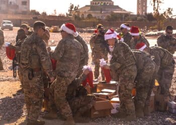 SOUTHWEST ASIA — Hundreds of American troops based in Syria received an early Christmas thanks to Operation Holiday Express. This year, Santa’s sleigh and reindeer came through by means of a CH-47 Chinook helicopter, with Combined Joint Task Force - Operation Inherent resolve leadership bringing gifts, messages from home, and the 1st Infantry Division Band to deployed troops, Dec. 24, 2019. (U.S. Army photo by Staff Sgt. Desmond Cassell)