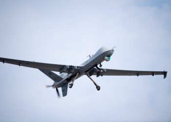 A U.S. Air Force MQ-9 Reaper assigned to the 432nd Wing/432nd Air Expeditionary Wing, flies above the flightline at Creech Air Force Base, Nevada, Sept. 1, 2021. MQ-9 aircrew provide dominant, persistent attack and reconnaissance for combatant commanders and coalition partners across the globe. (U.S. Air Force photo by Tech. Sgt. Emerson Nuñez)