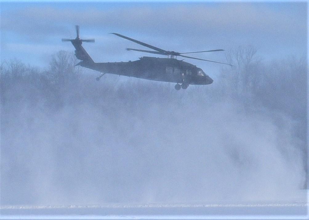 GRAYLING, Mich. – U.S. Army Soldiers from Bravo Company 1-147 Aviation Battalion in Grand Ledge, MI fly in to pick up Fire Support Teams from Delta Battery, 1st Battalion 120th Field Artillery Regiment