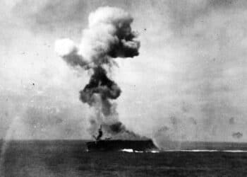 The USS Cabot (CVL-28) shortly after being hit by a Kamikaze attack on November 25, 1944. Alden Wadleigh, who was on the flight deck at the time of the attack, visited Naval Air Station Pensacola on July 27, 2022. Photo from the National Museum of the U.S. Navy.