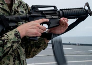 220910-F-LN908-2625 ATLANTIC OCEAN (Sept. 10, 2022) Cryptologic Technician Jonah Brandes, from Phoenix, releases a magazine during an M4 rifle shoot aboard the Lewis B. Puller-class expeditionary sea base USS Hershel "Woody" Williams (ESB 4), Sept. 10, 2022.