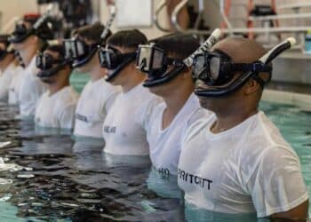 Sailors assigned to Naval Aviation Schools Command (NASC) stand in formation during the Aviation Rescue Swimmer School Preparatory Course in Pensacola, Florida, June 21, 2023. NASC is one of the more than 1,640 subordinate learning sites that serve as a part of the Naval Education and Training Command (NETC) domain.