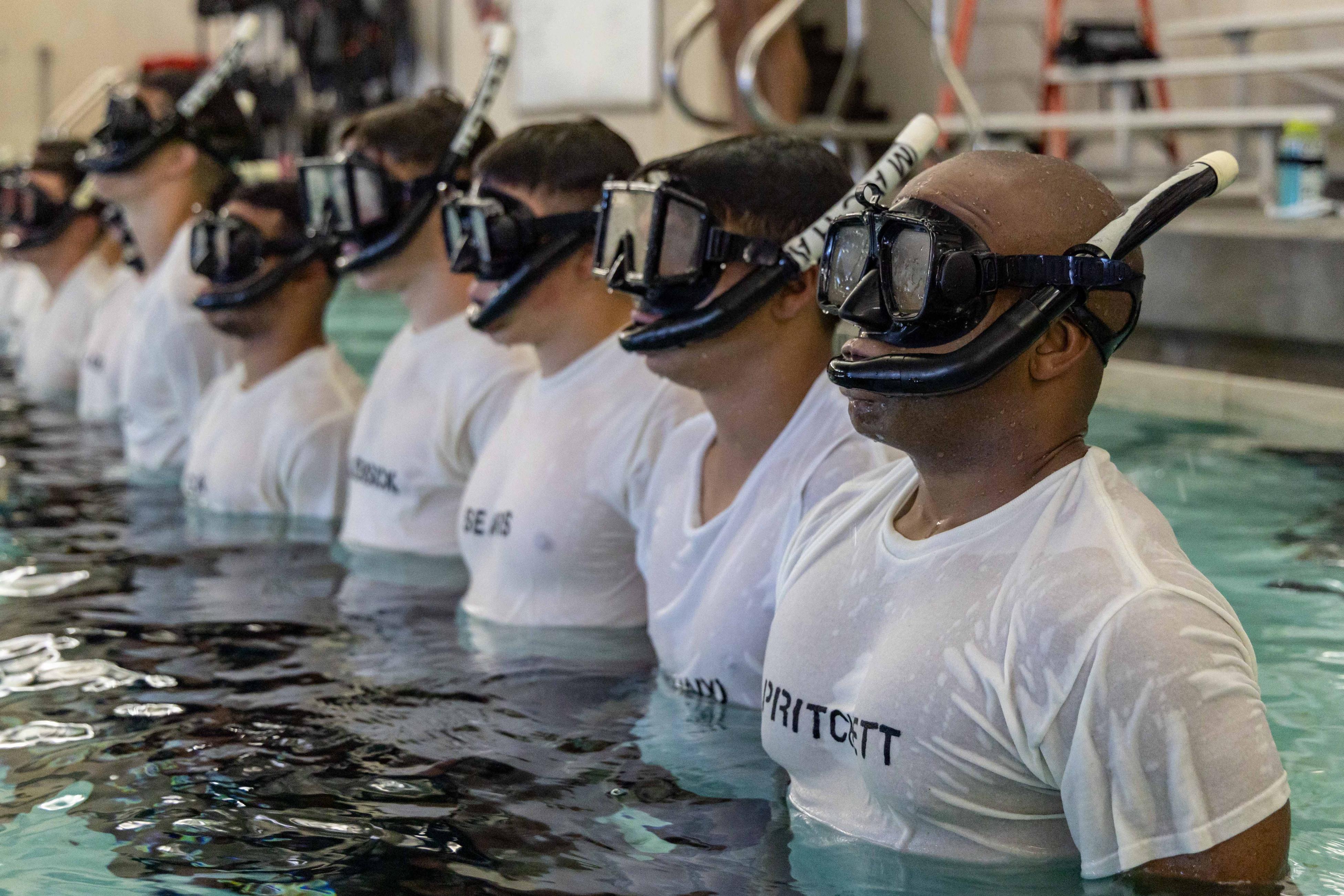 Sailors assigned to Naval Aviation Schools Command (NASC) stand in formation during the Aviation Rescue Swimmer School Preparatory Course in Pensacola, Florida, June 21, 2023. NASC is one of the more than 1,640 subordinate learning sites that serve as a part of the Naval Education and Training Command (NETC) domain.