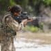 Marine Mauqueita Carter, a Turks and Caicos Islands service member, shoots at a range target at Camp Seweyo during TRADEWINDS 2023 (TW23), July 20, 2023.