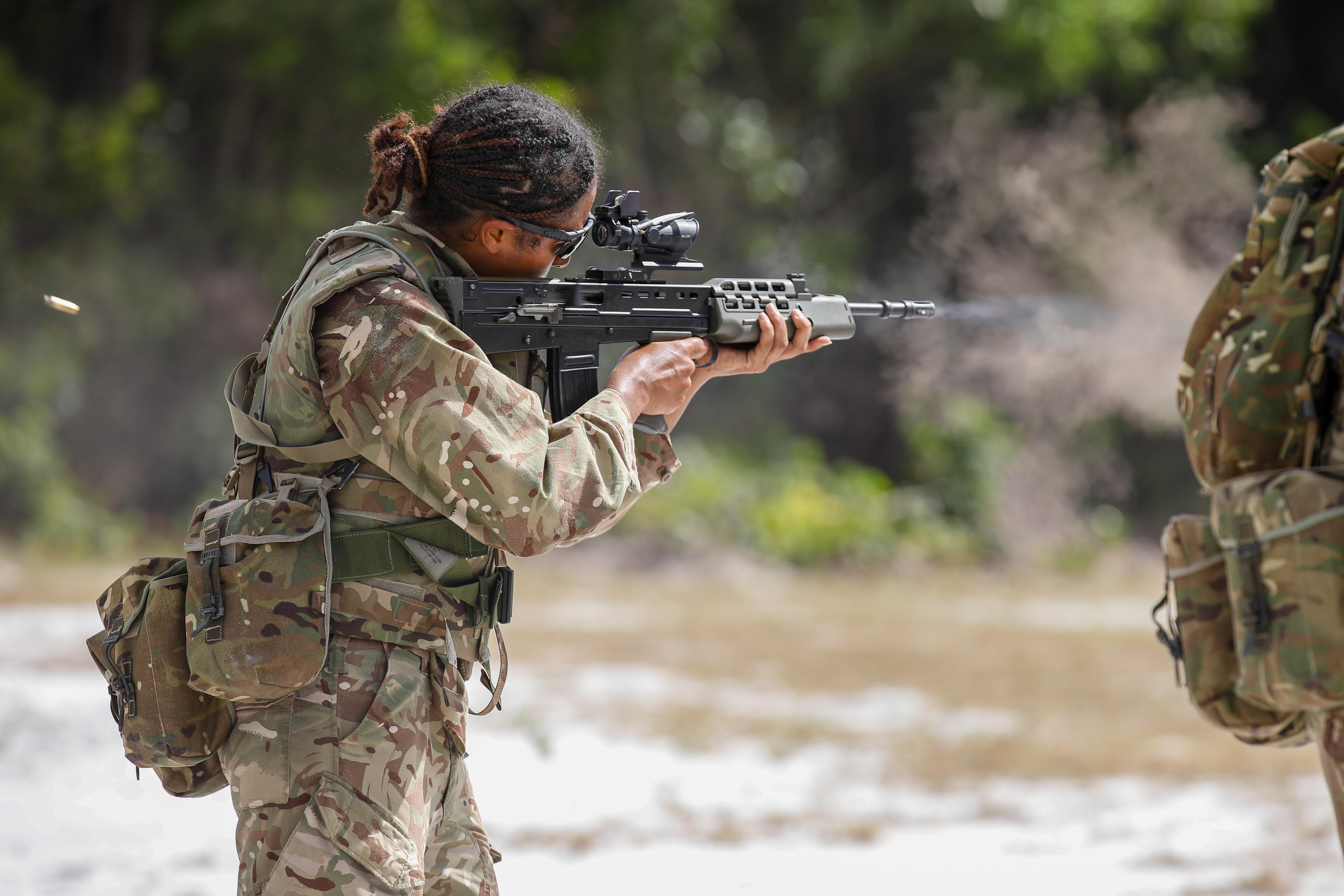 Marine Mauqueita Carter, a Turks and Caicos Islands service member, shoots at a range target at Camp Seweyo during TRADEWINDS 2023 (TW23), July 20, 2023.