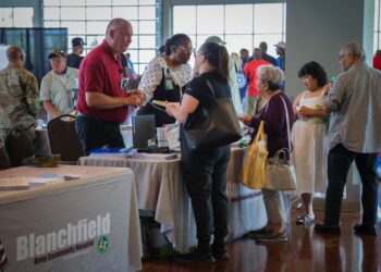 BACH leaders, Col. Sam Preston, hospital commander, and Brandi Johnson, deputy director for Partnerships and Outlying Clinics, joined U.S. Department of Veterans Affairs officials at the PACT Act Summer Fest, Aug. 10, in Clarksville, Tennessee. With the nearest VA Medical Center 50 miles away, BACH-VA resource sharing agreements for surgery, audiology, orthopedics, and intensive care, provide VA patients in the local community access to care closer to home.