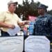 Kenneth Ledbetter, marketing outreach coordinator of the United States Military Apprenticeship Program, discusses certification programs with a sailor during the annual education fair at Naval Air Station North Island. The educational fair hosted more than 75 colleges and universities and provided sailors an opportunity to learn about various degree programs offered by each school and certifications that can be earned through USMAP and Navy COOL.