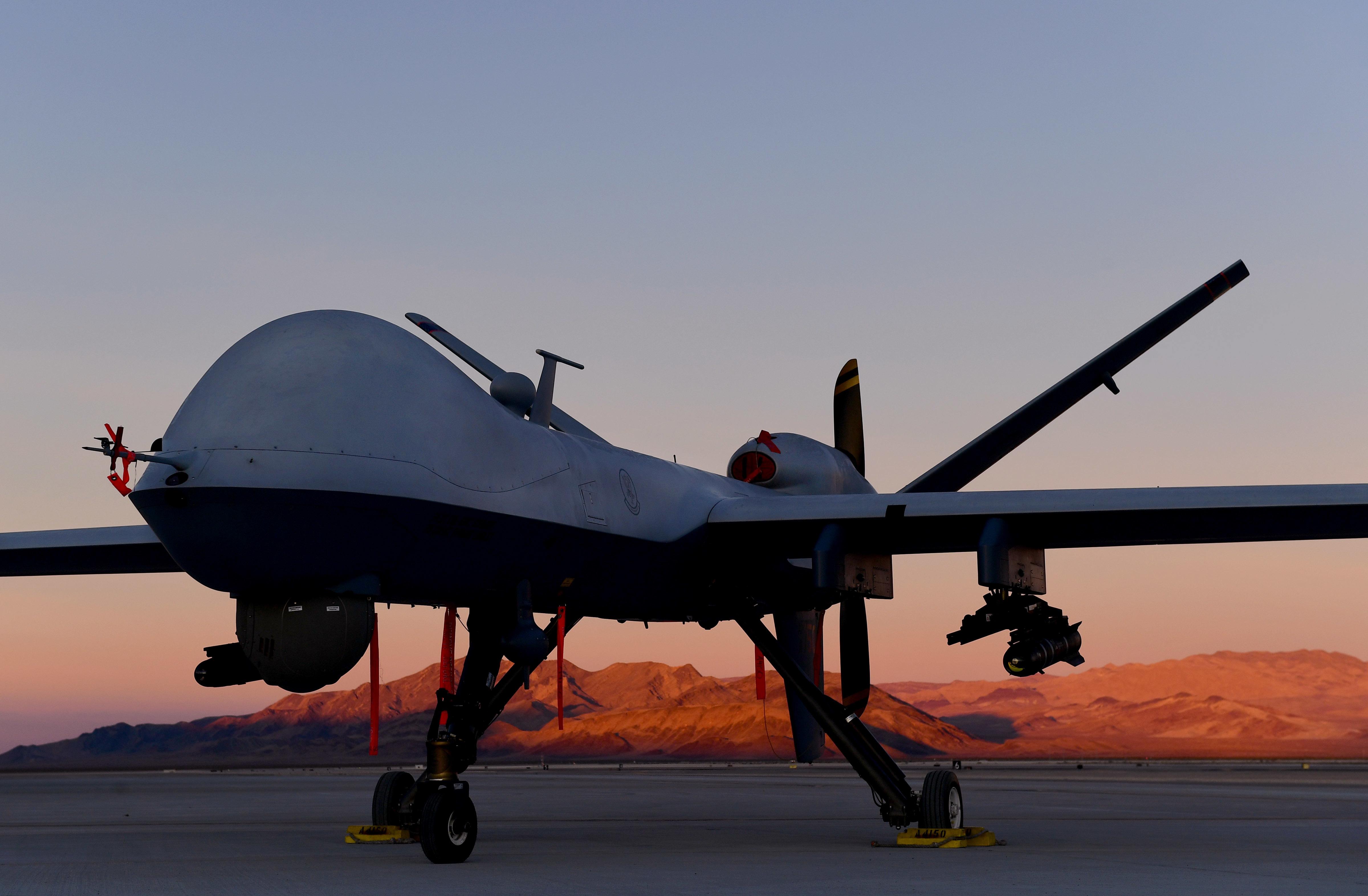 An MQ-9 Reaper sits on the flight line at Creech Air Force Base, Nevada, Dec. 17, 2019. The Remotely Piloted Aircraft enterprise is made of Airmen across all career fields to deliver justice to our Nation’s enemies 24/7/365. (U.S. Air Force photo by Senior Airman Haley Stevens)