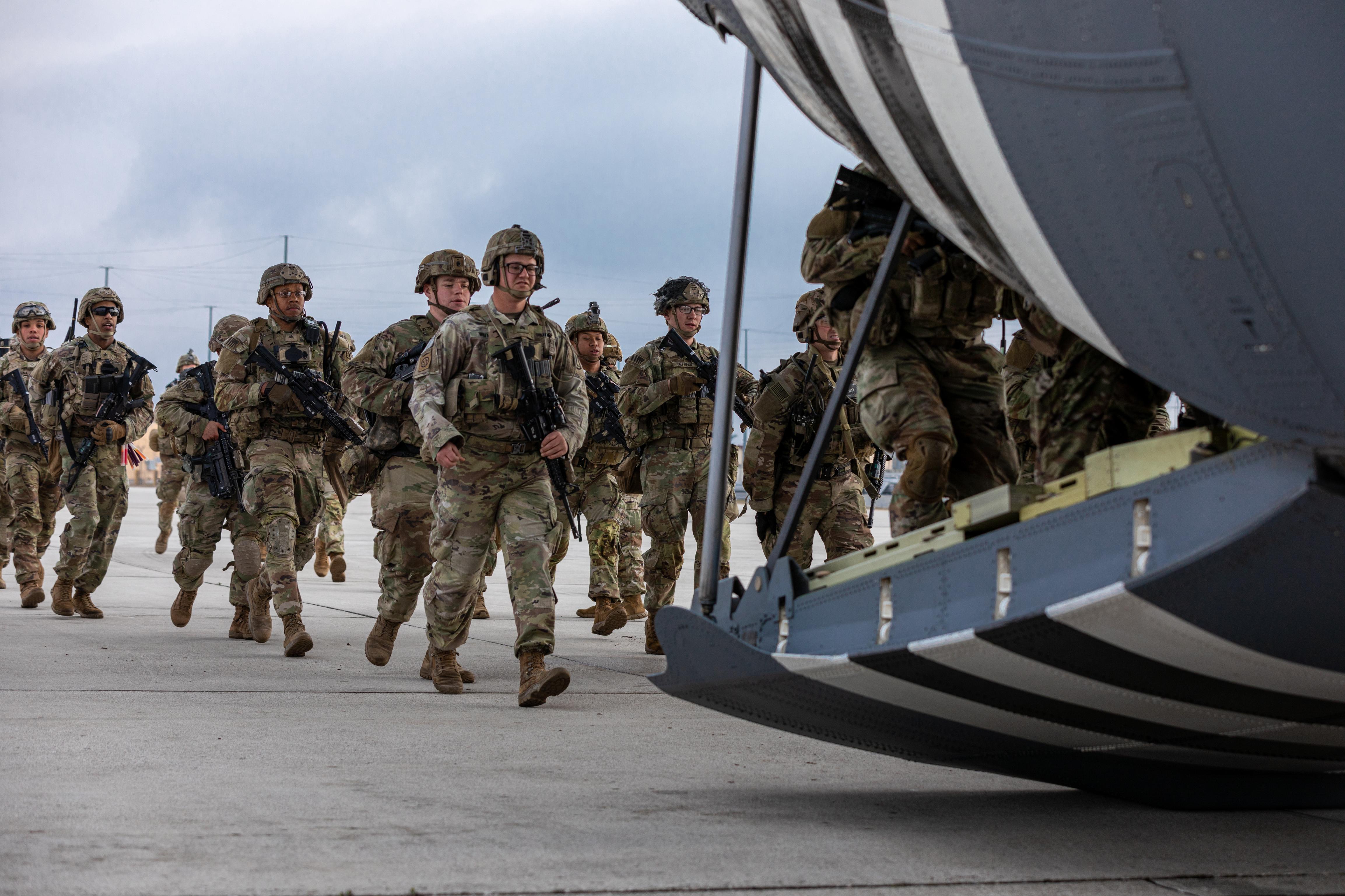 U.S Army Soldiers from the 173rd Airborne Brigade walk through securing an airfield as they conduct squad drills at Aviano Air Base, Italy, March 7, 2023. Squad drills are good practice to prepare for the no-notice rapid deployment capabilities of U.S. Africa Command’s North and West Africa Response Force, which is made up of elements of the 173rd Airborne Brigade and U.S. Army Southern European Task Force, Africa (SETAF-AF), from Vicenza, Italy. (U.S. Army photo by Sgt. Matthew Prewitt)
