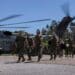 U.S. Marine Corps General Eric M. Smith, the Assistant Commandant of the Marine Corps, and III Marine Expeditionary Force leadership, unload from a CH-53E Super Stallion at Camp Hansen, Okinawa, Japan, Sep. 12, 2023. Smith met with key leaders from the 31st Marine Expeditionary Unit to discuss crisis response capabilities and Marine Corps modernization efforts.