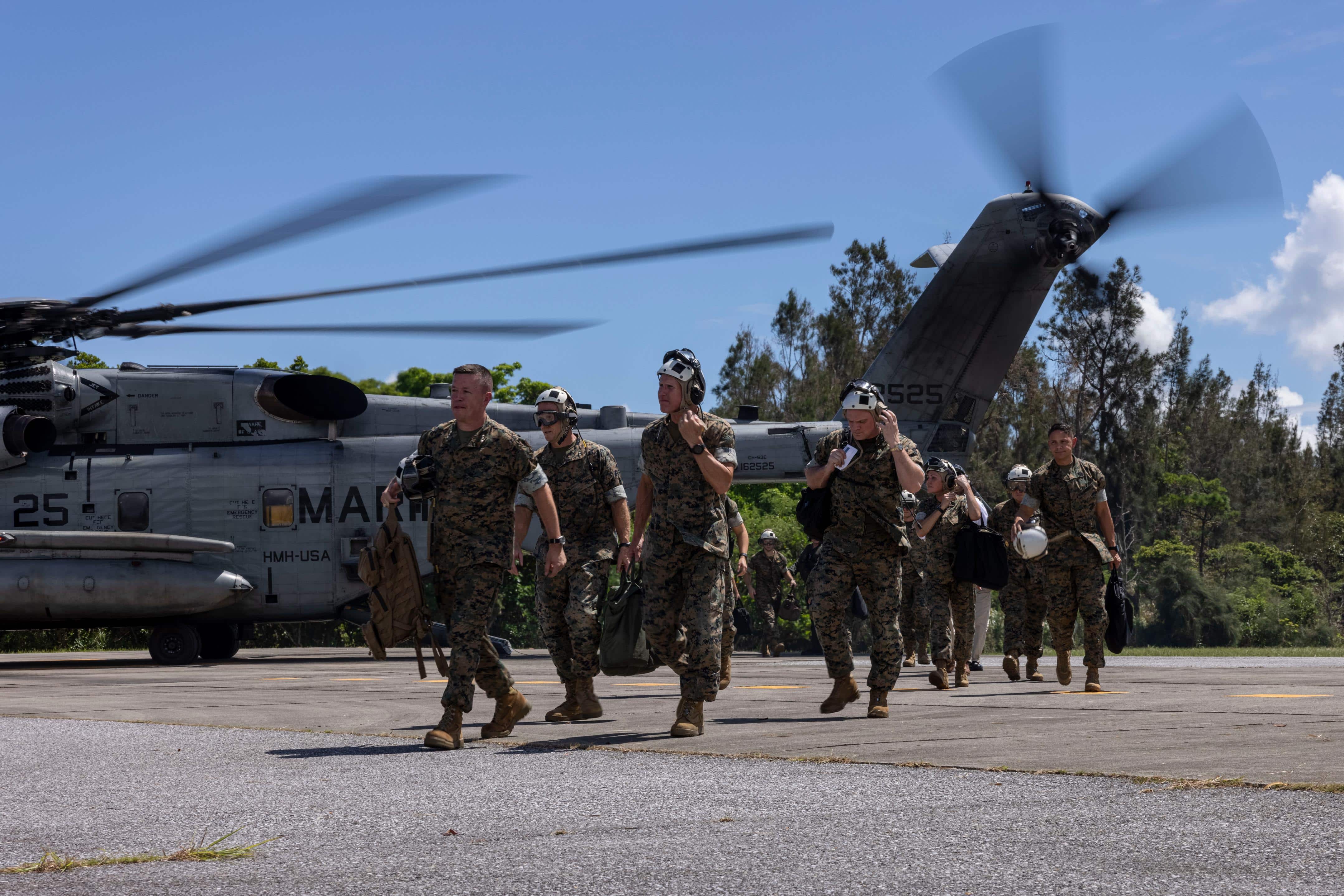 U.S. Marine Corps General Eric M. Smith, the Assistant Commandant of the Marine Corps, and III Marine Expeditionary Force leadership, unload from a CH-53E Super Stallion at Camp Hansen, Okinawa, Japan, Sep. 12, 2023. Smith met with key leaders from the 31st Marine Expeditionary Unit to discuss crisis response capabilities and Marine Corps modernization efforts.