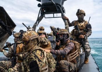 Service members form the Philippine Naval Special Operation Command and U.S. Special Operations Task Force 511.2 patrol in the Basilan Strait during a Joint Maritime Security Training Exercise conducted throughout the Sulu Archipelago, Philippines, Nov. 22, 2023.