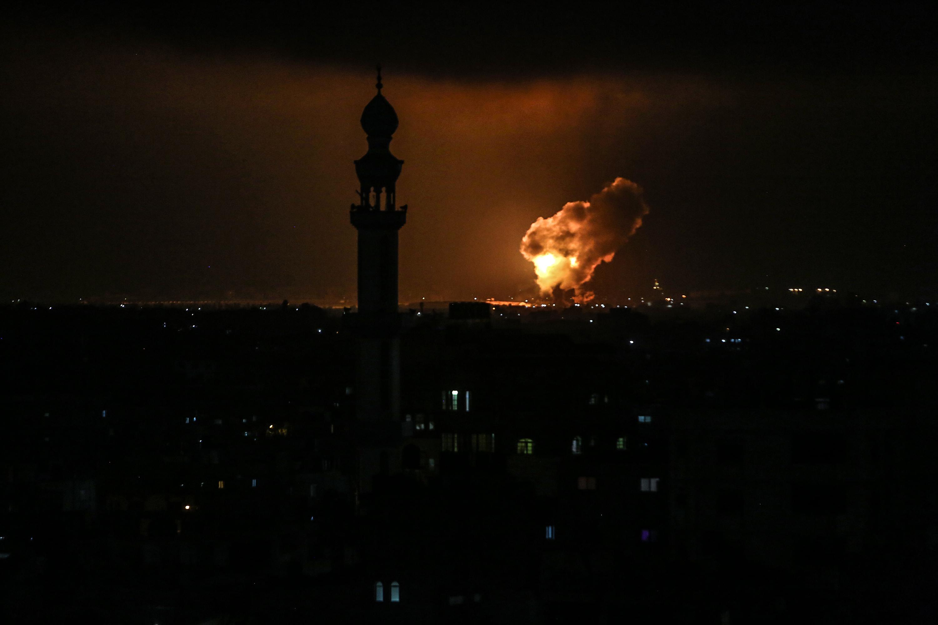 Fire billow from Israeli air strikes in Rafah the southern Gaza Strip, controlled by the Palestinian Islamist movement Hamas. May 11, 2021. Photo by Abed Rahim Khatib