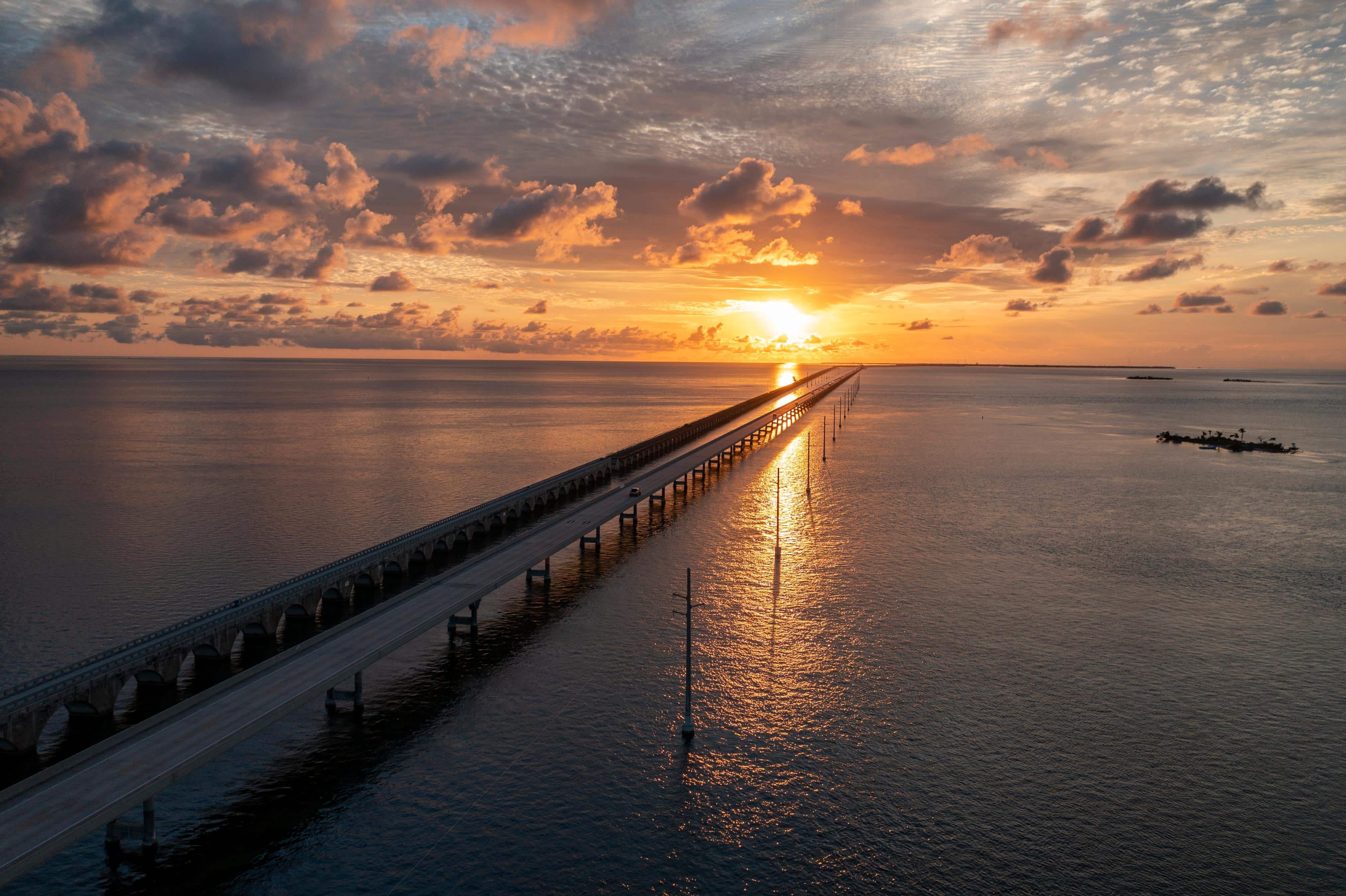 Aerial panoramic view of sunrise in the Florida Keys along the Overseas Highway 1 Seven Mile Bridge