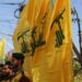 south government-tyre city-Lebanon 25-10-2023: Yellow Hezbollah flags