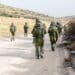 Israeli combat soldiers of an elite unit counter-terror squad return to base after a raid on terror targets in South of Lebanon during the Second Lebanon military campaign / war. Infantry battalion.