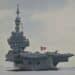 France Sends Carrier Group Through Suez as 51-Nation Hormuz Escort Coalition Takes Shape